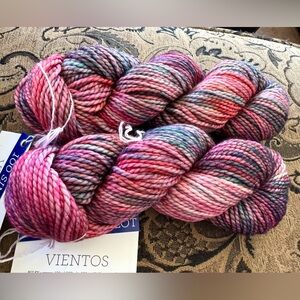 Malabrigo Vientos Hand-Dyed Yarn in Pink and Purple